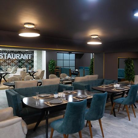 Dora Hotel Шымкент Экстерьер фото
